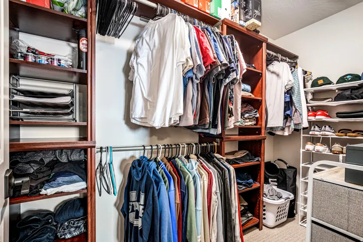 Walk in closet with carpet