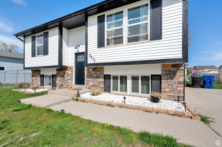 View of front of property with stone siding
