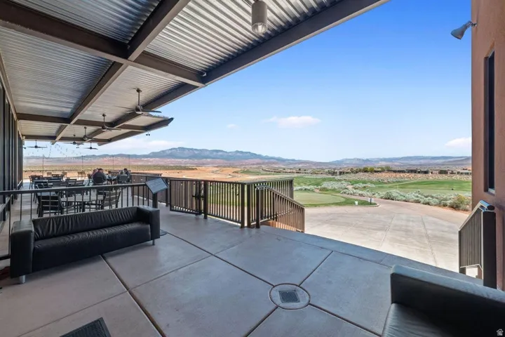 View of patio / terrace with a mountain view and an outdoor living space