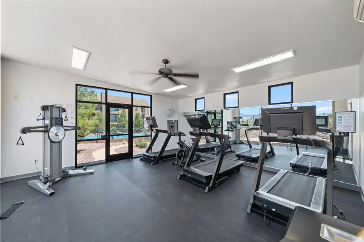 Workout area featuring a ceiling fan