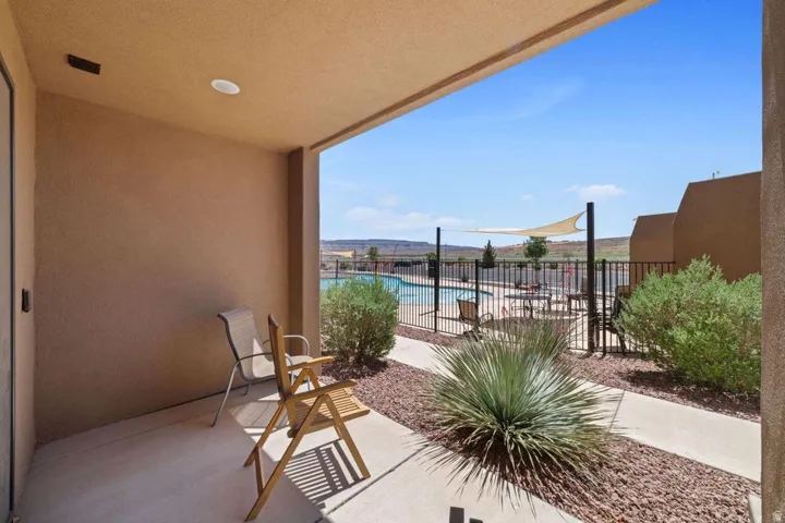View of patio / terrace featuring a community pool