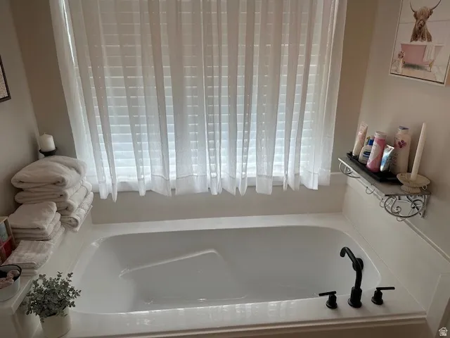 Full bath with a bath