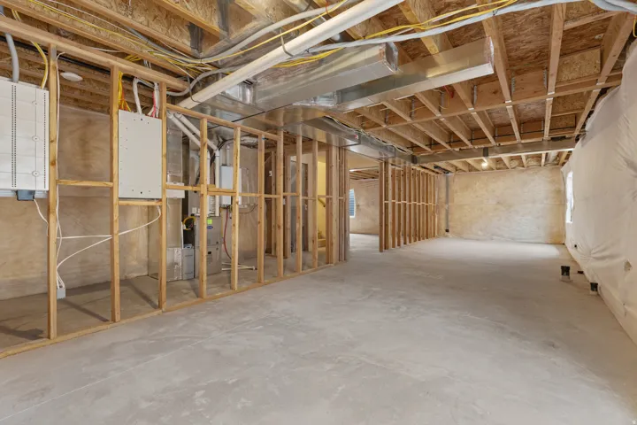 Unfinished basement with heating unit