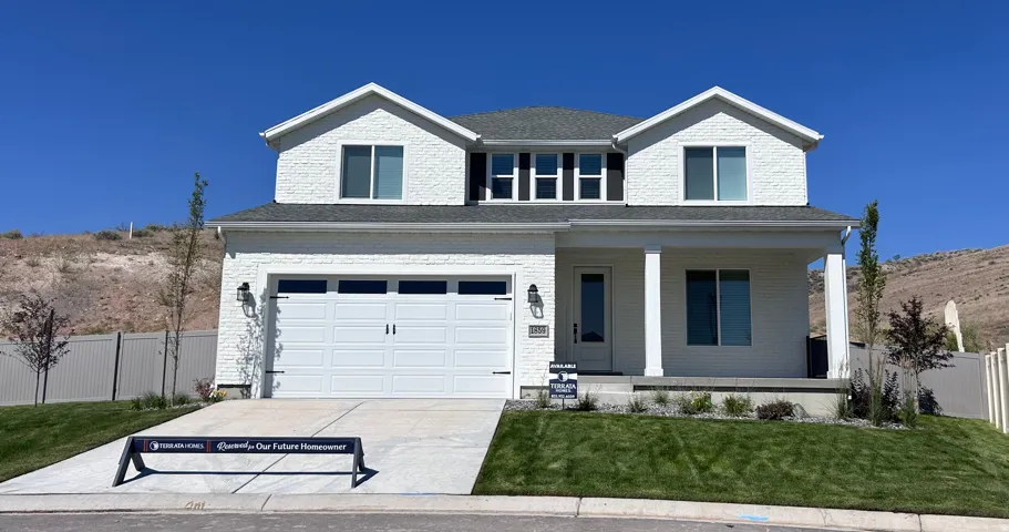 Contemporary two-story residence with white brick facade