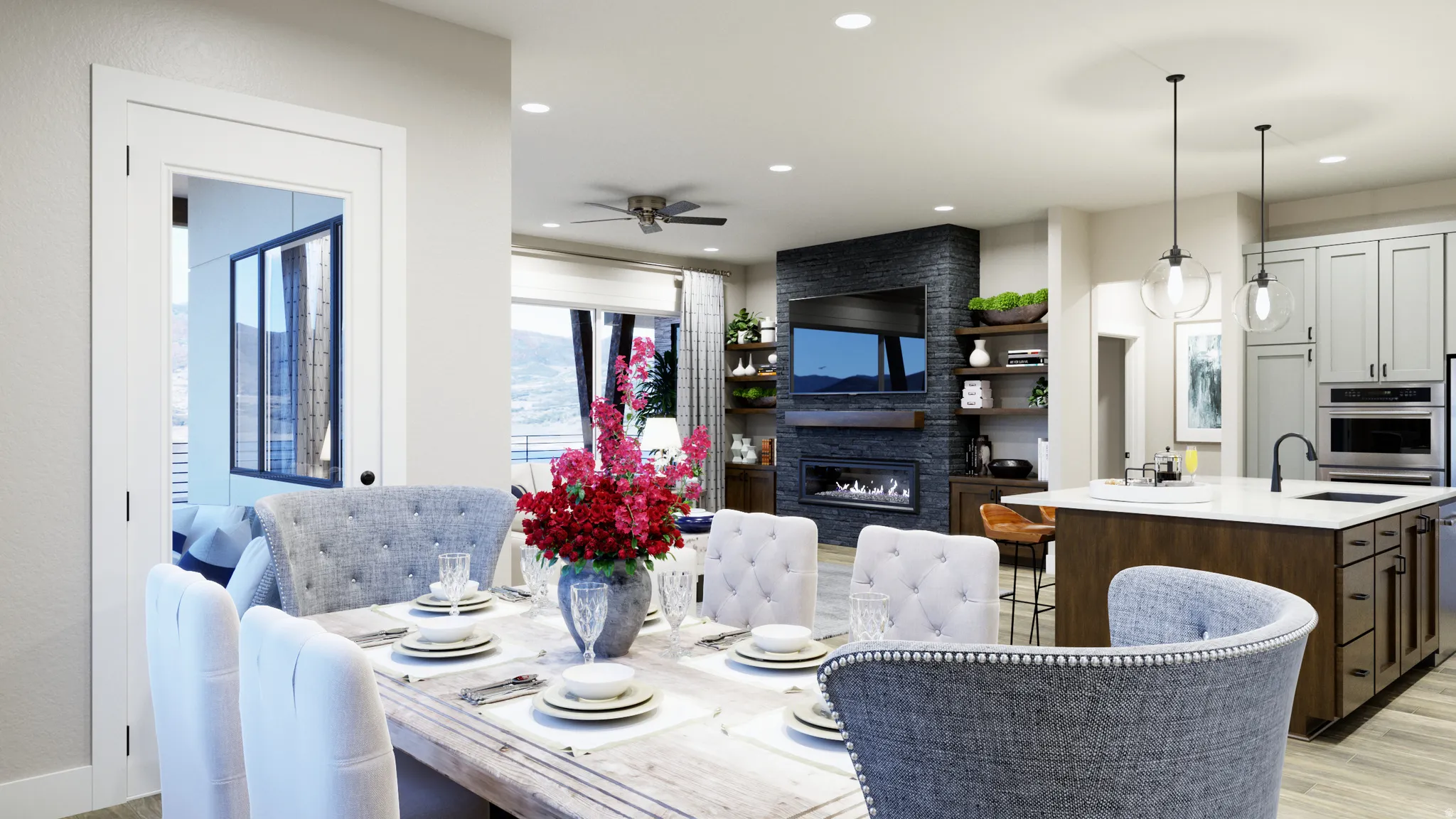 Dining area featuring light wood-style flooring, a ceiling fan, a large fireplace, and recessed lighting