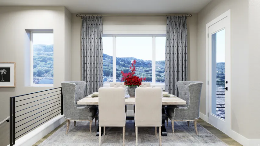 Dining area with light wood finished floors and plenty of natural light