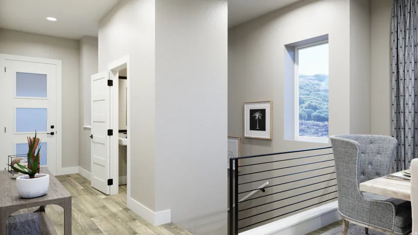 Hall featuring light wood-type flooring and a textured wall