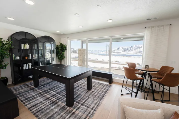 Rec room featuring light wood finished floors and recessed lighting