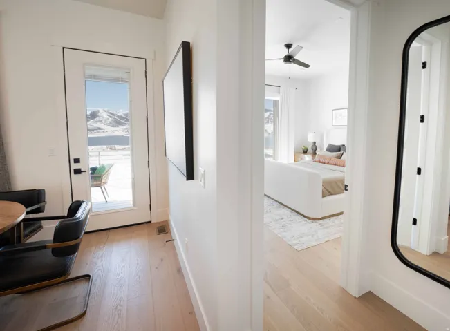 Hallway featuring light wood-style floors and a mountain view