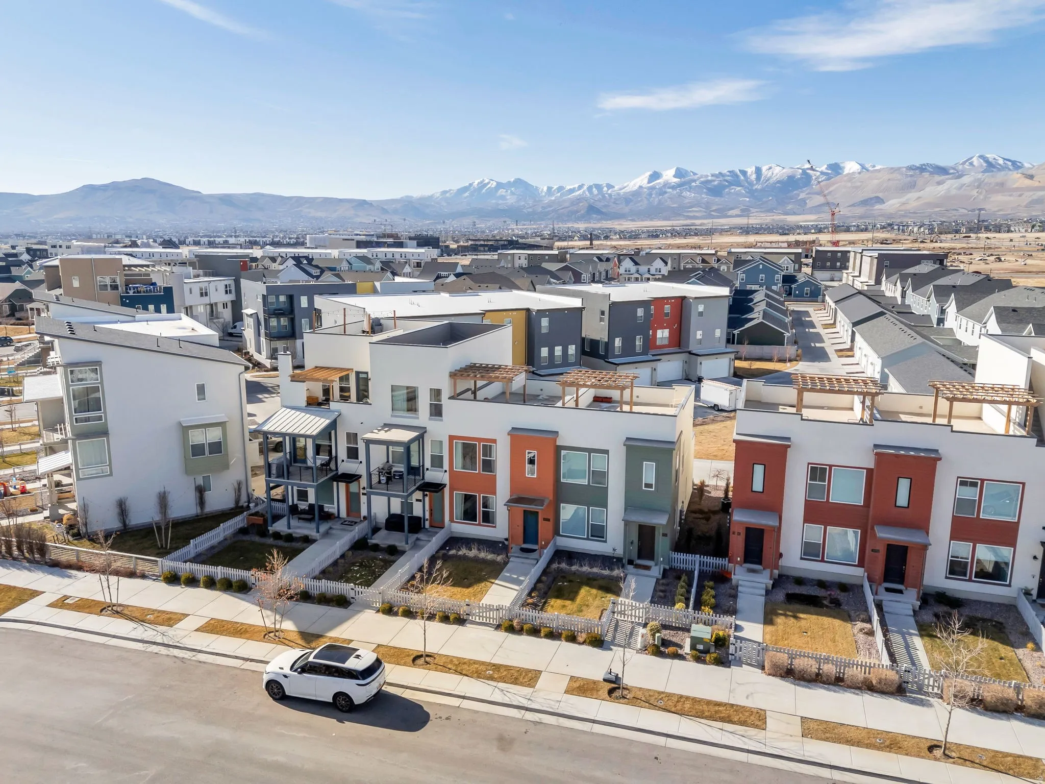 Aerial perspective of suburban area with mountains