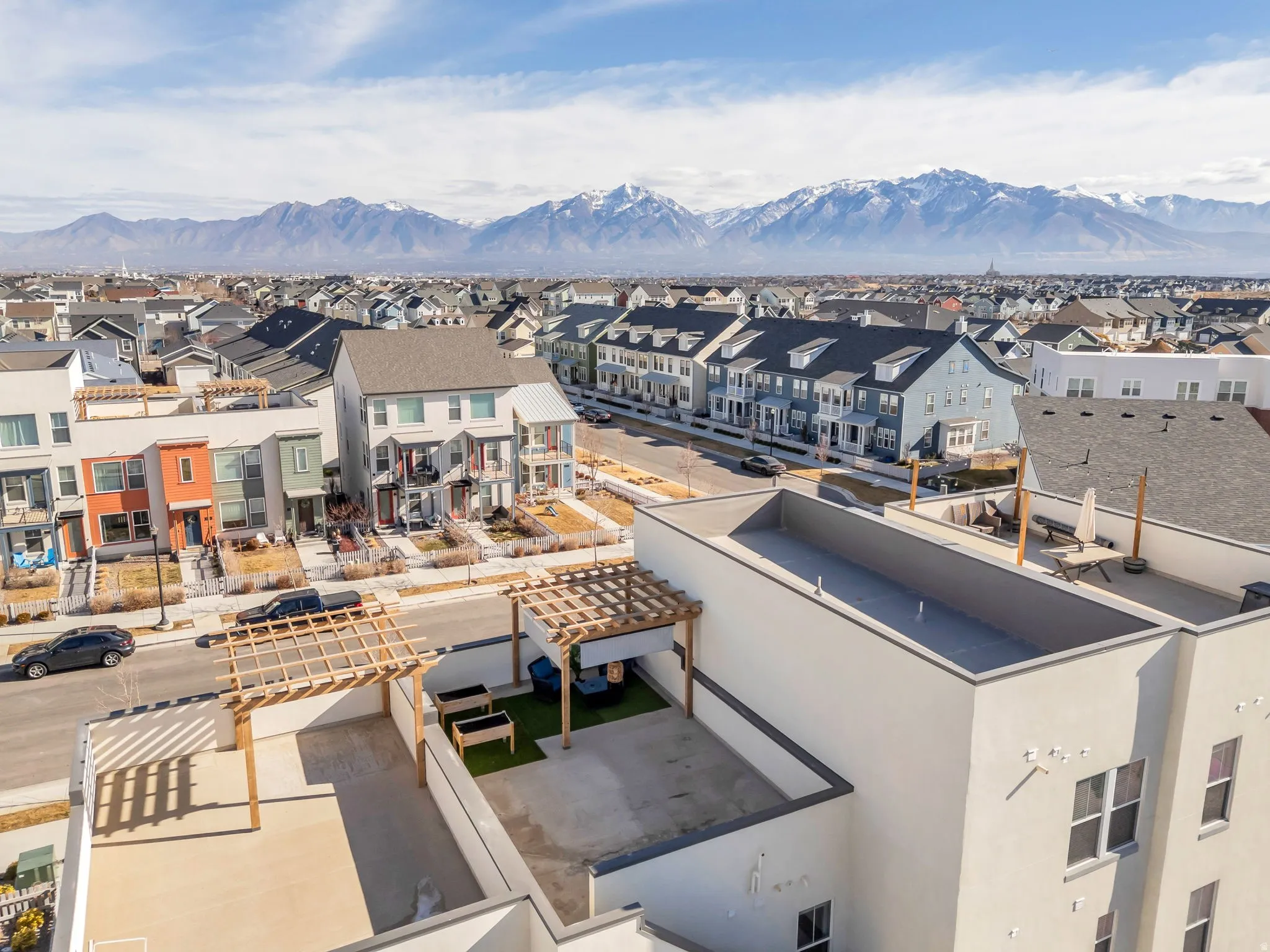 Aerial view of residential area with a mountainous background