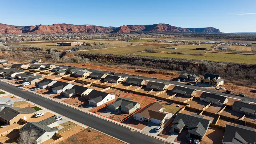 Aerial view of residential area featuring mountains