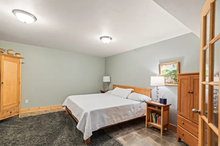 Bedroom featuring light tile patterned floors