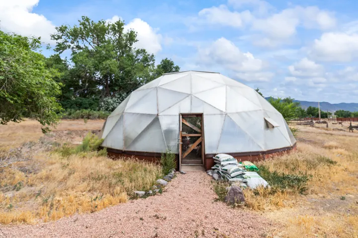 View of greenhouse with a mountain view