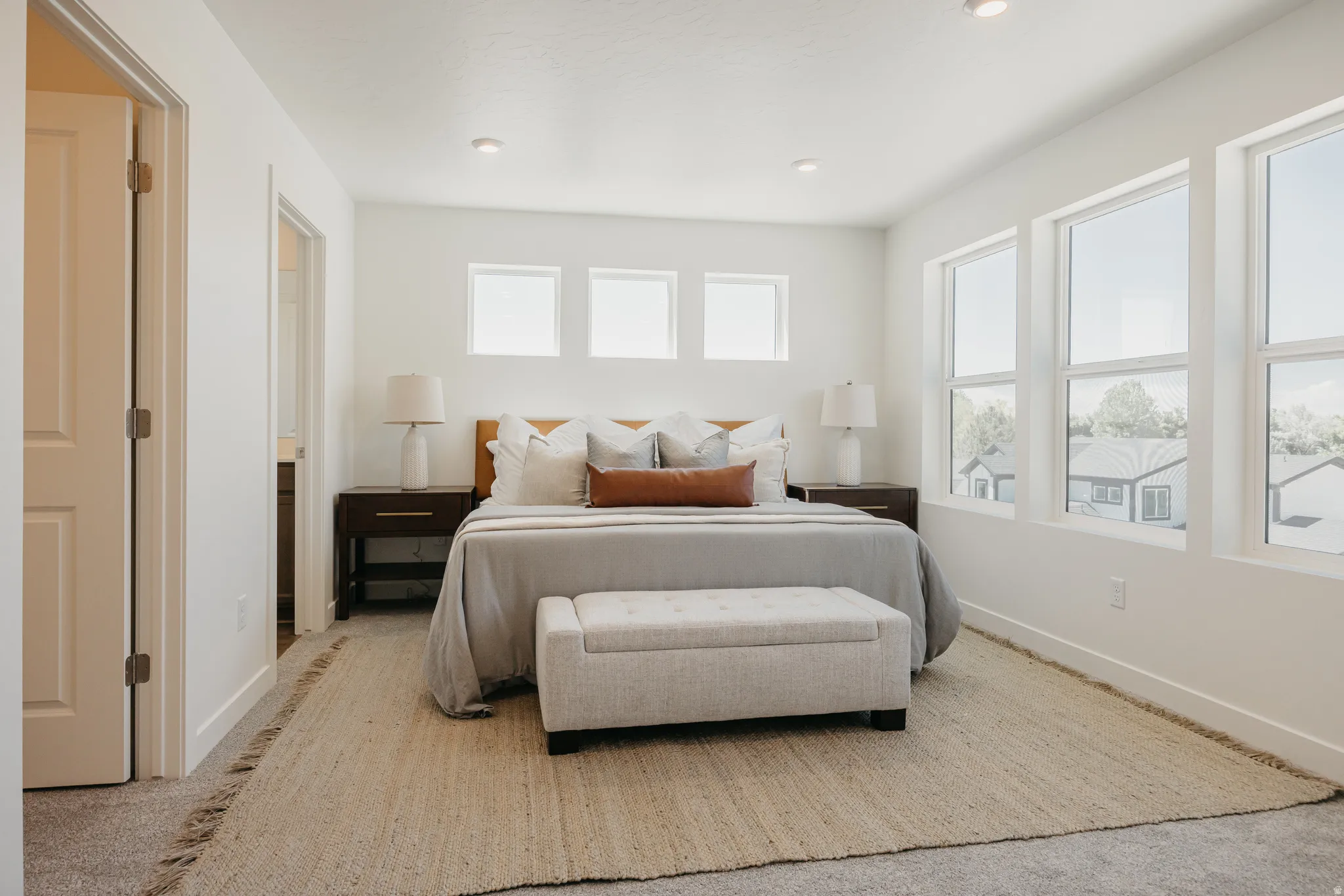 Bedroom with carpet floors and recessed lighting
