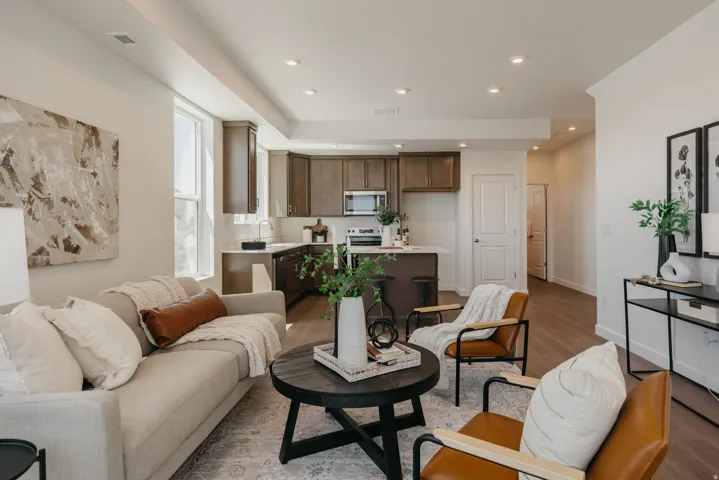 Living area featuring light wood-type flooring and recessed lighting