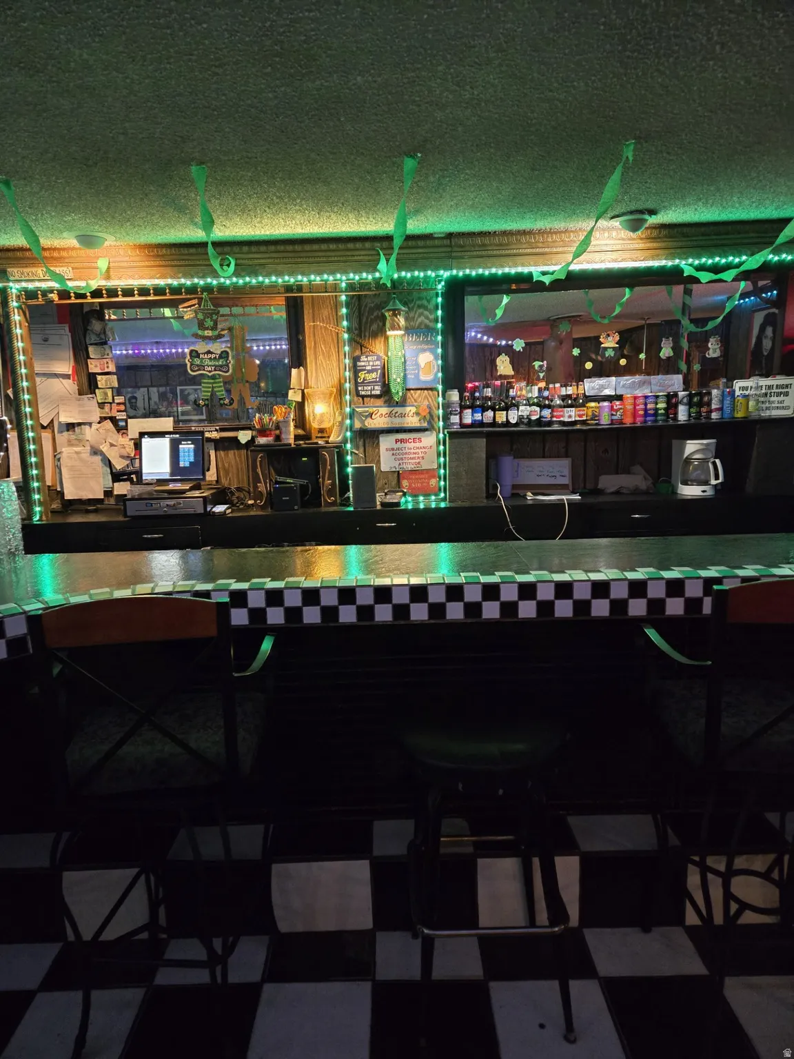 Community bar area featuring a textured ceiling