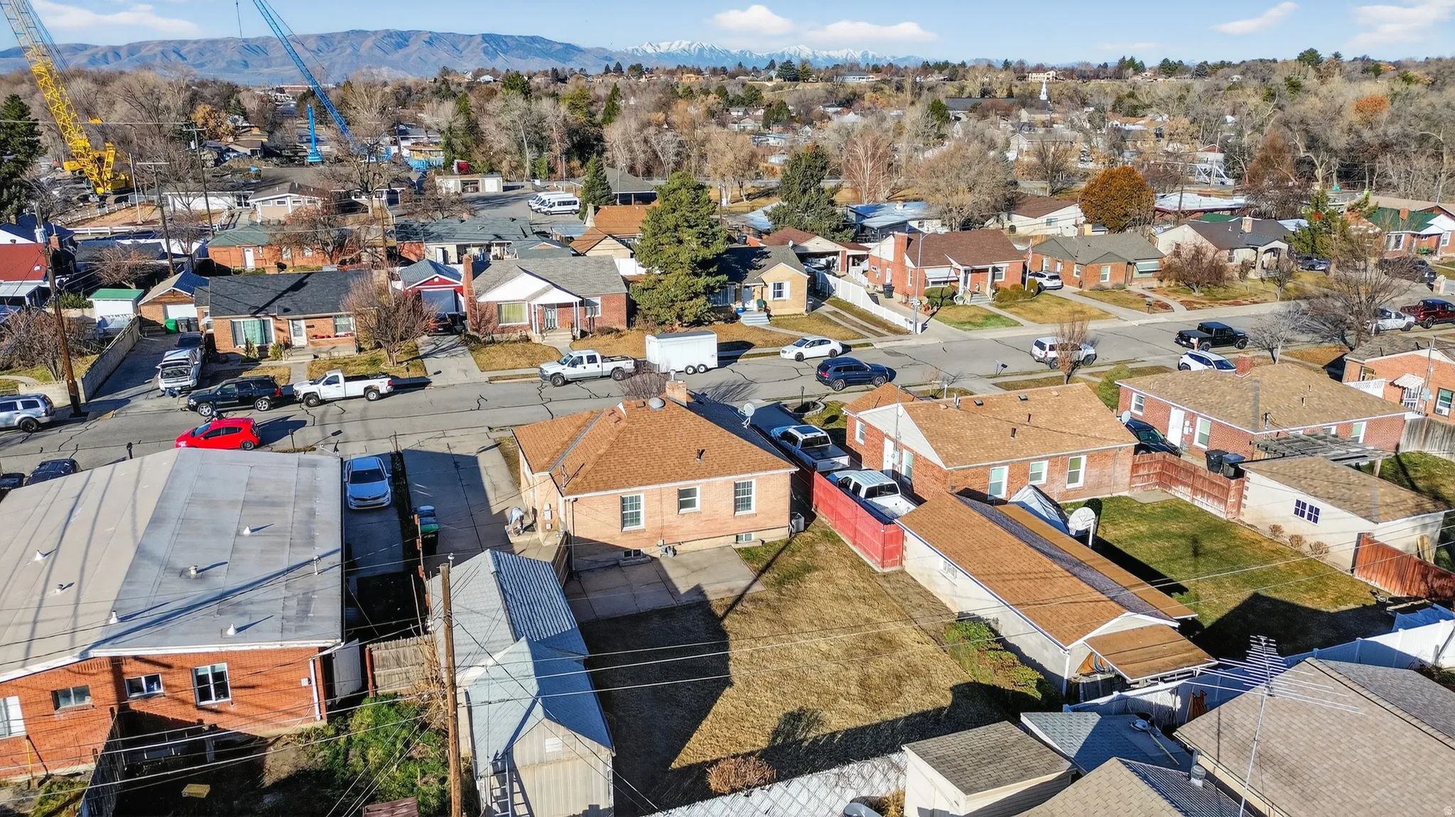 Aerial perspective of suburban area with mountains