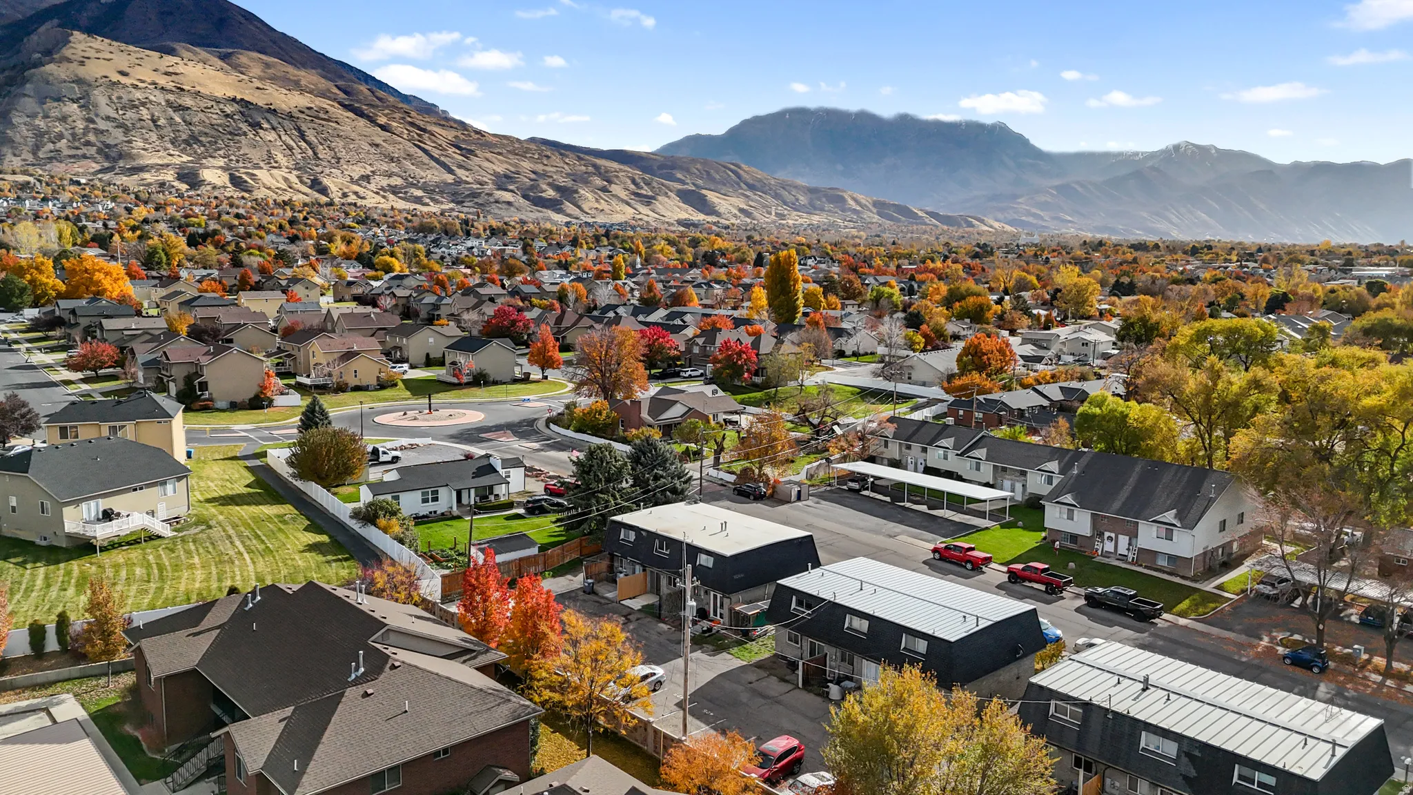 Aerial view of residential area with mountains