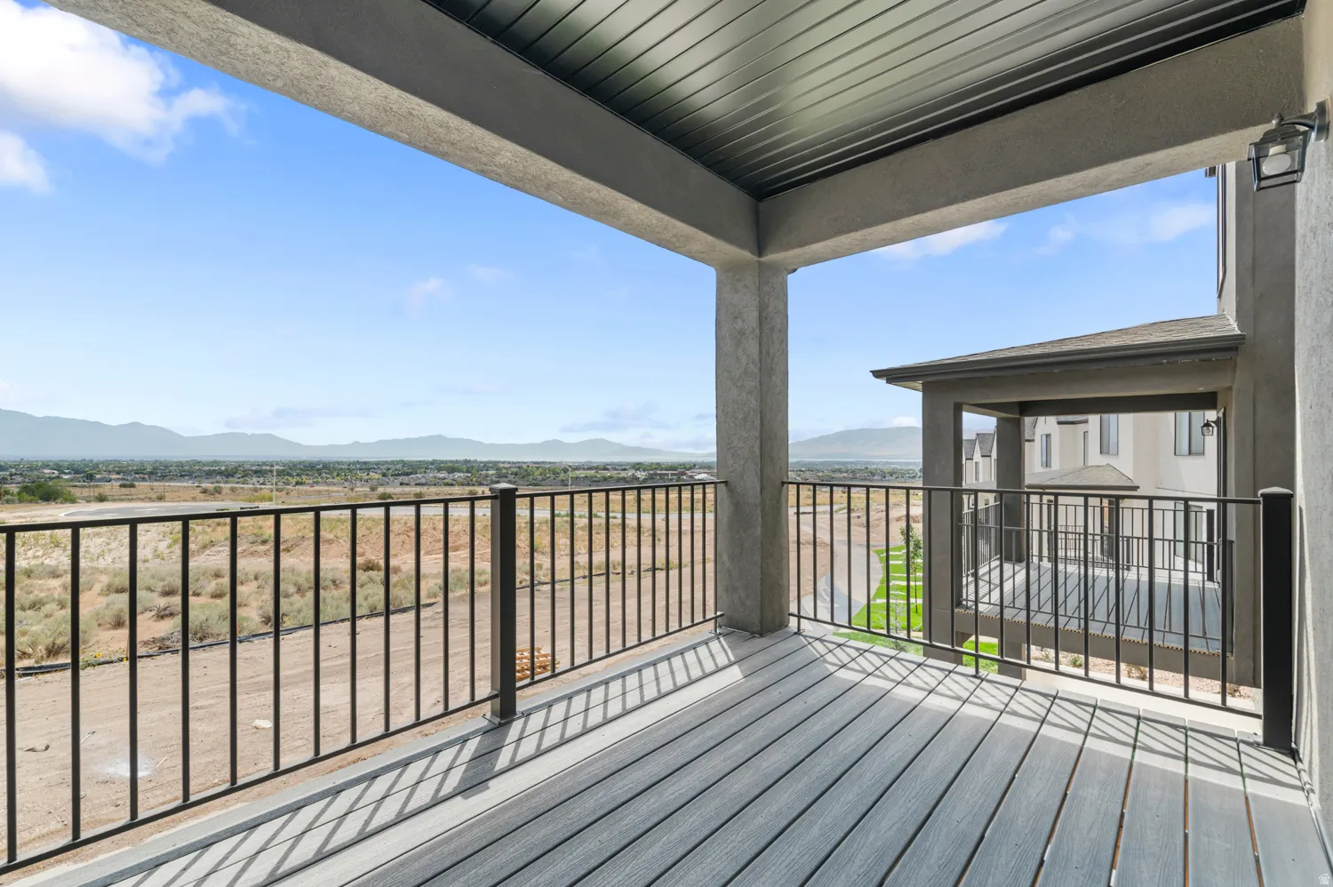 Wooden deck featuring a mountain view