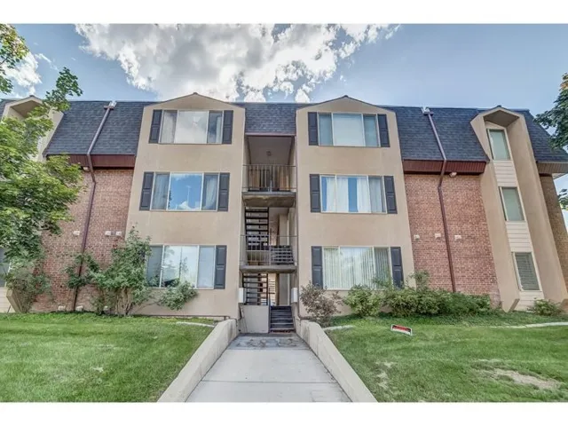 View of apartment building / complex with stairs