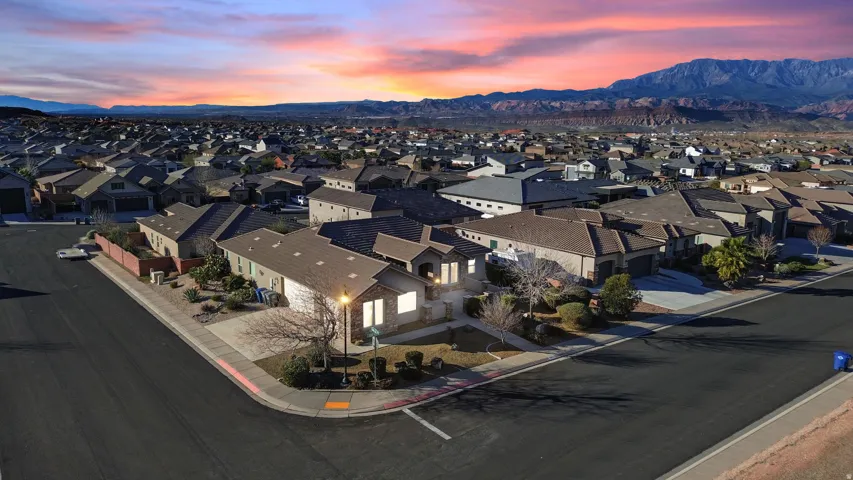 Aerial view at dusk of a residential view and a mountain view