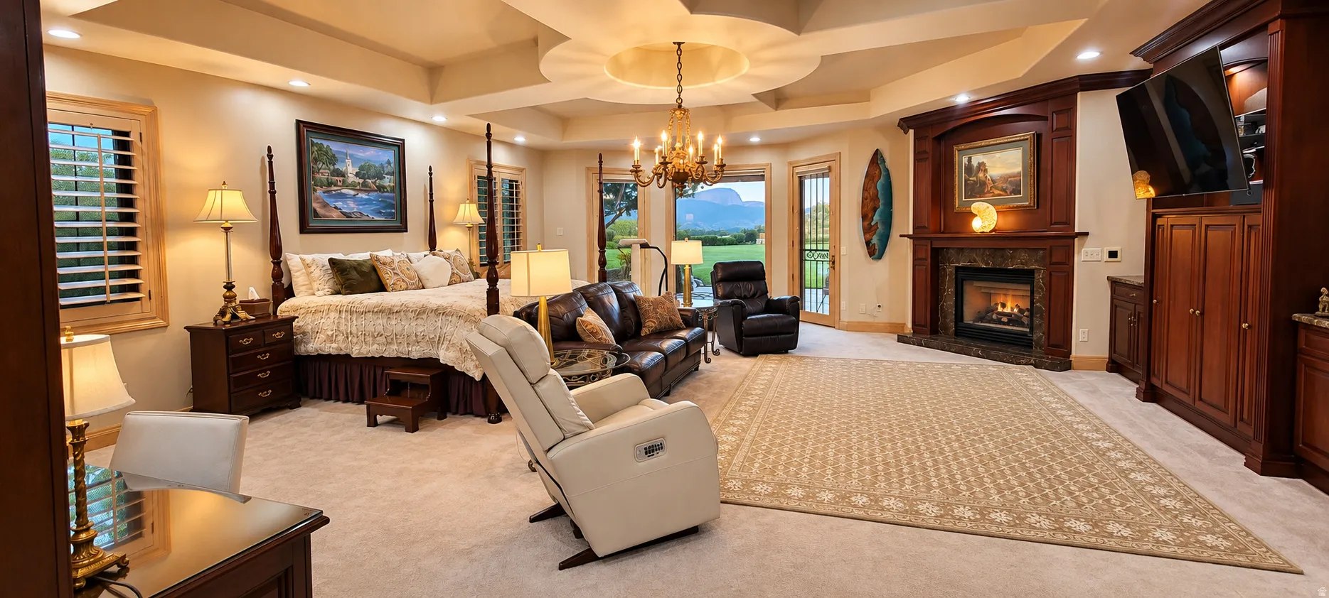 Recessed ceiling with chandelier, built-in fireplace with a stone surround, French doors, plantation shutters, and extensive built-in cabinetry