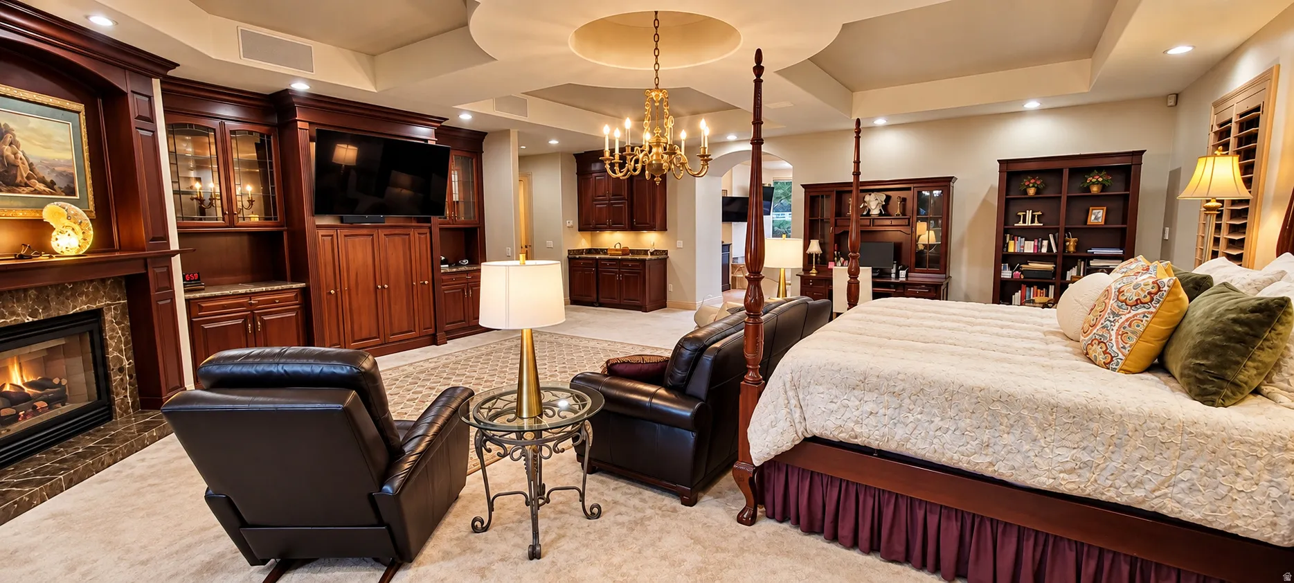 Built-in entertainment center, recessed lighting, coffered ceiling, fireplace with stone surround, and integrated wet bar