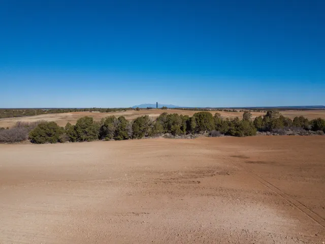 View of undeveloped land with rural landscape and mountains