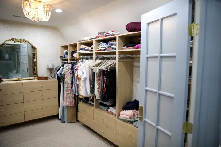 Walk in closet with built in shelving