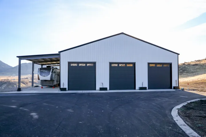 64x64 shop with covered RV psrking and hookups
