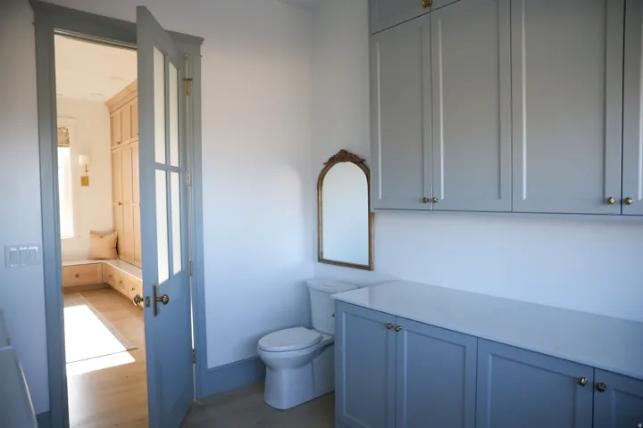 Laundry room with half bath