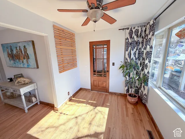 Sunroom exits onto the covered patio area
