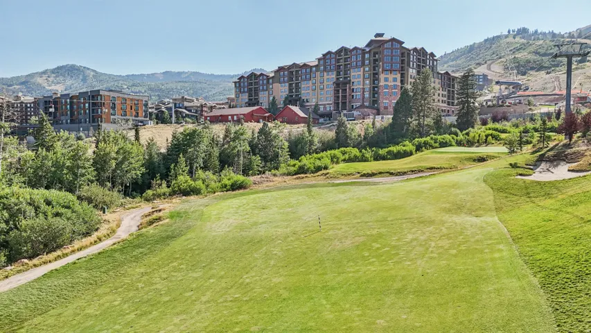 View of community featuring a mountain view and golf course view