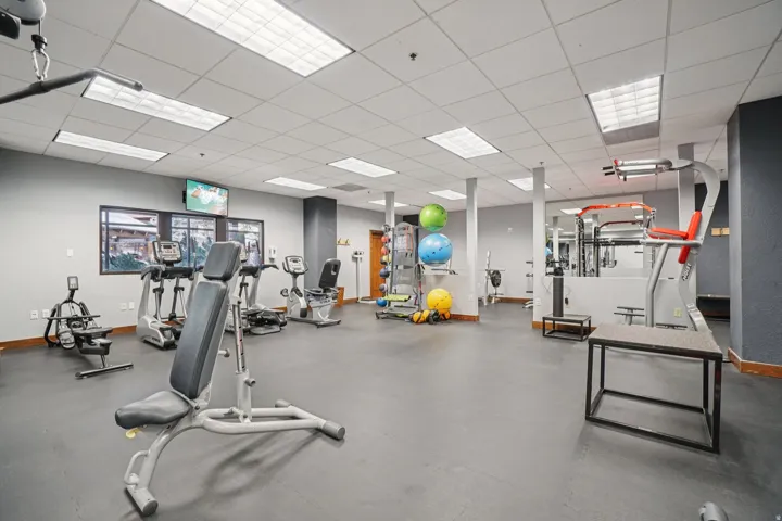 Exercise room featuring a paneled ceiling