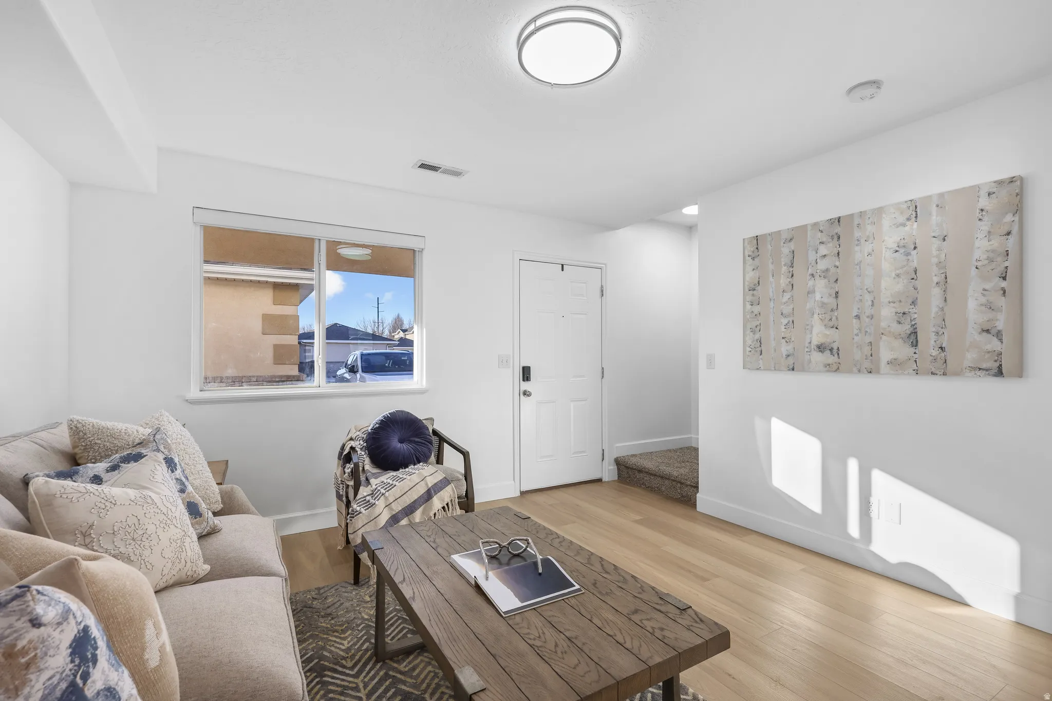 Living area featuring NEW LPV Luxury Vinyl flooring