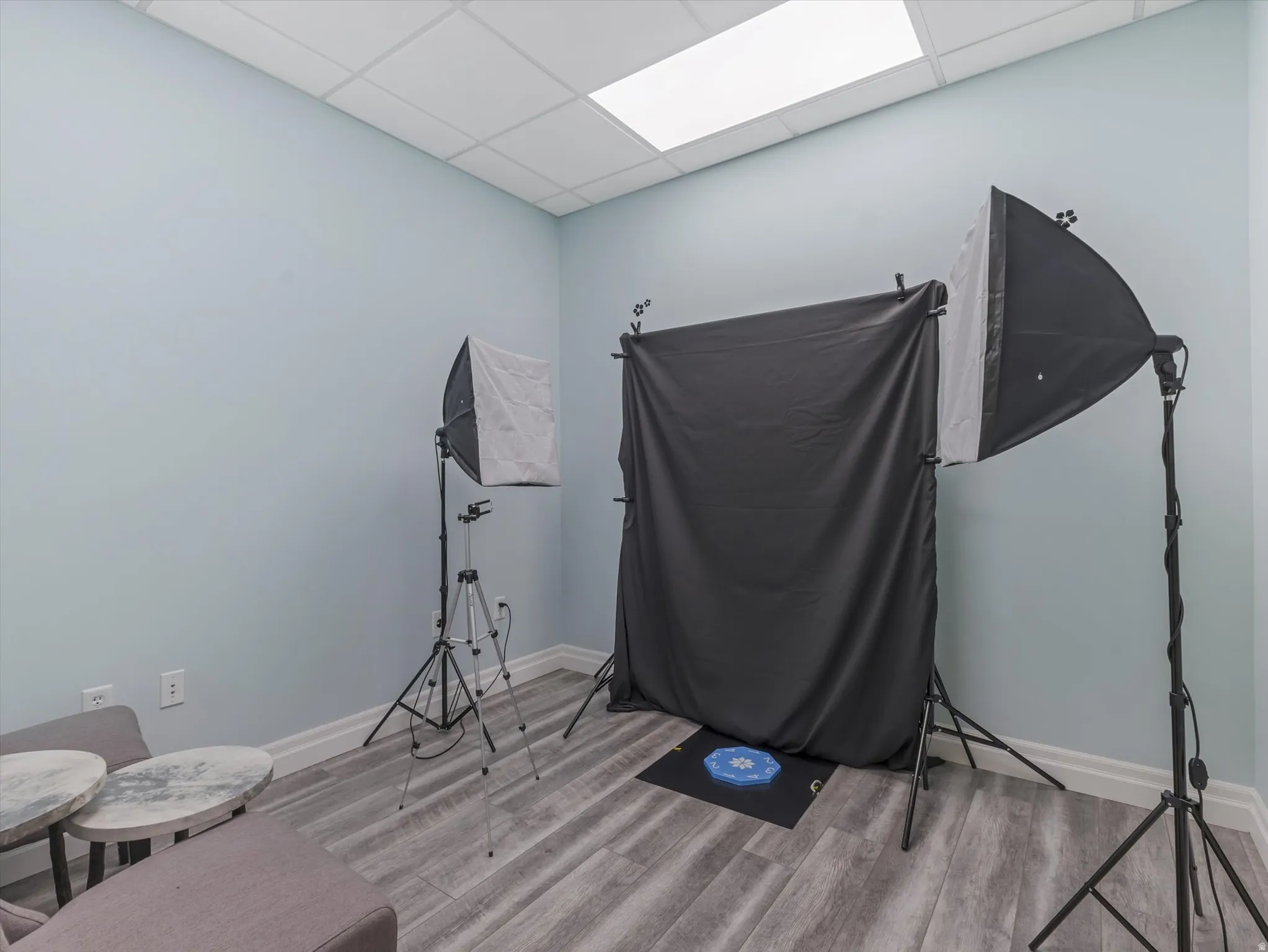 Miscellaneous room with a paneled ceiling