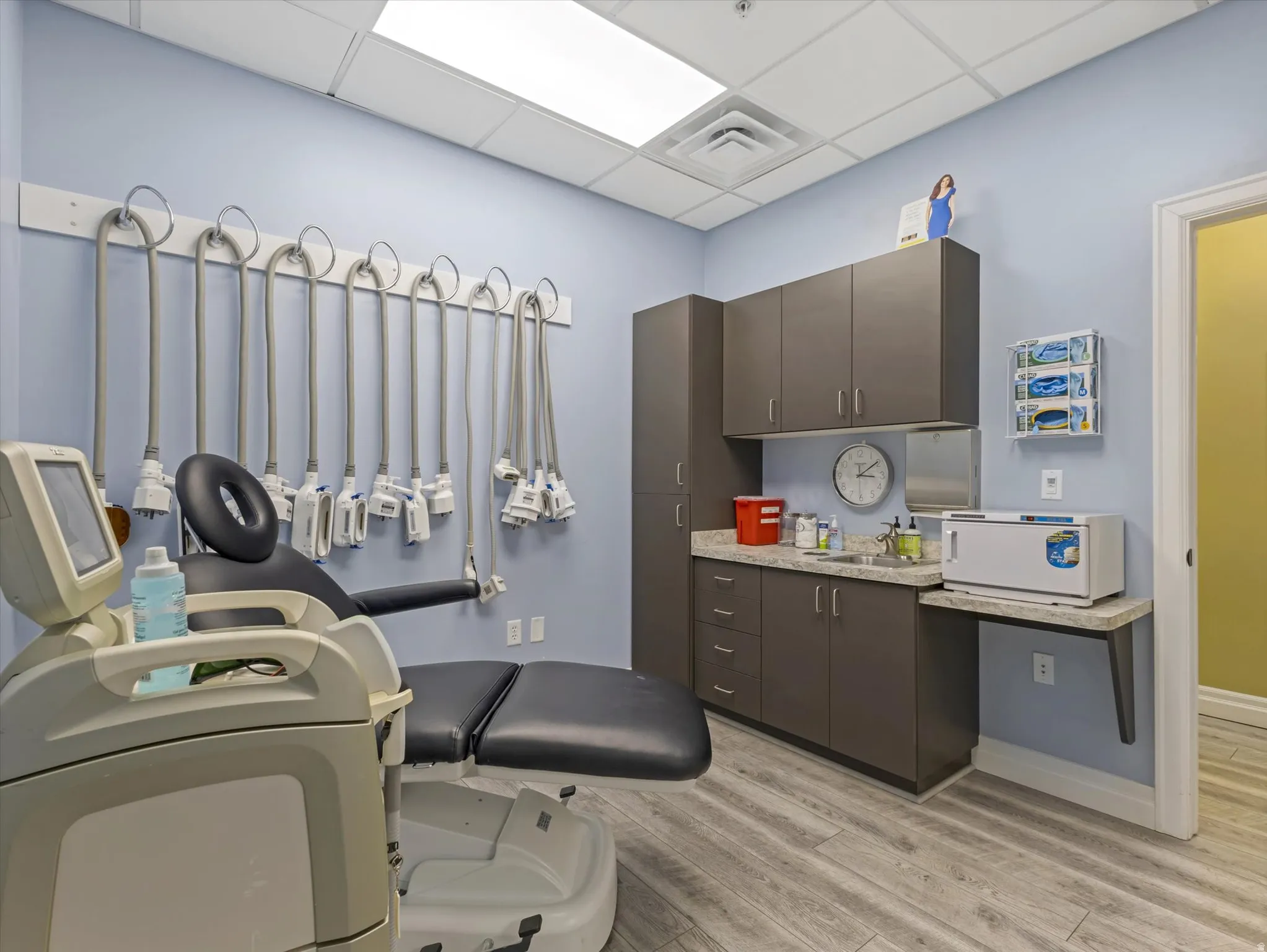 Laundry area with a paneled ceiling and washer / clothes dryer