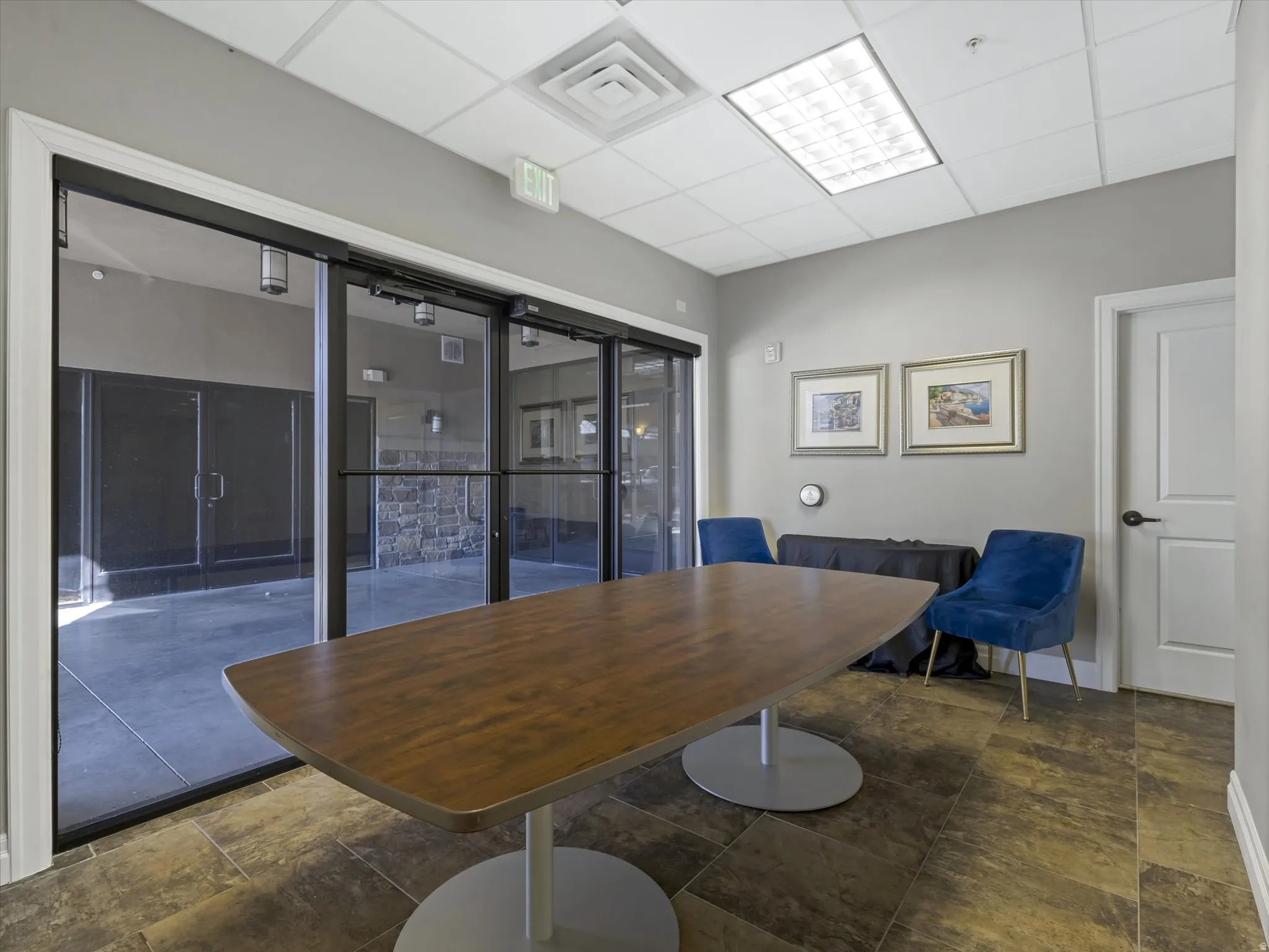 Dining space with a paneled ceiling