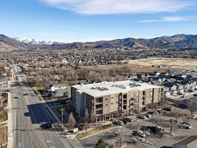 Bird's eye view of a mountainous background and apartment complex