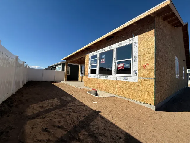 View of home's exterior with a patio area and a fenced backyard