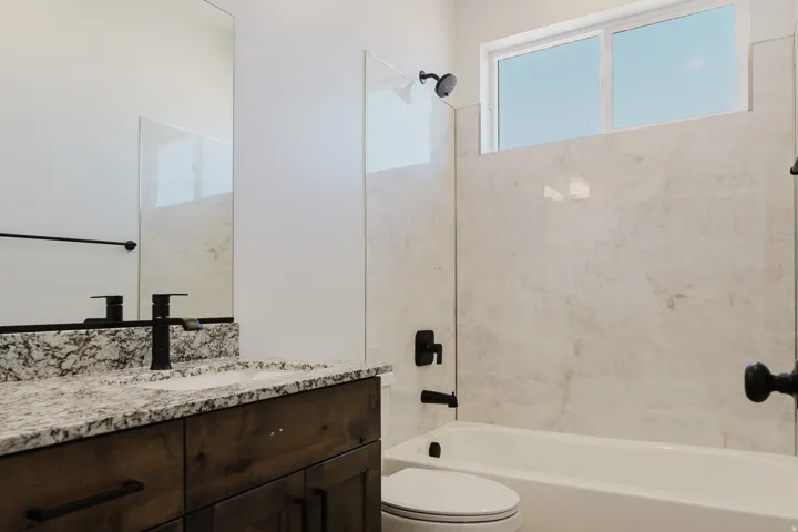 Full bathroom featuring bathing tub / shower combination and vanity