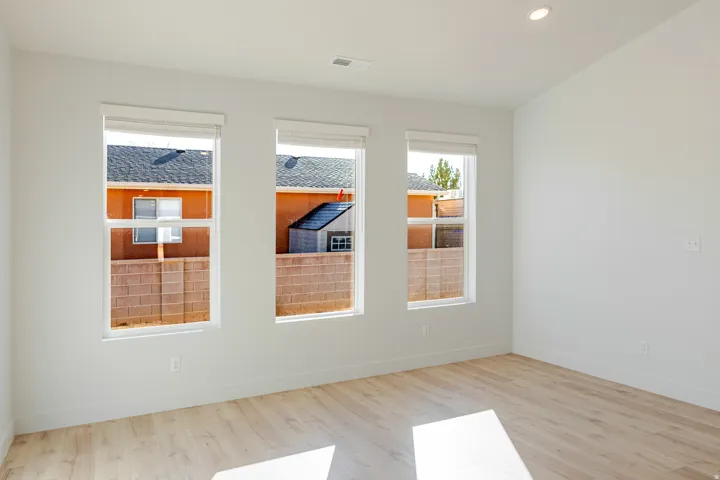 Spare room with light wood-style flooring and recessed lighting