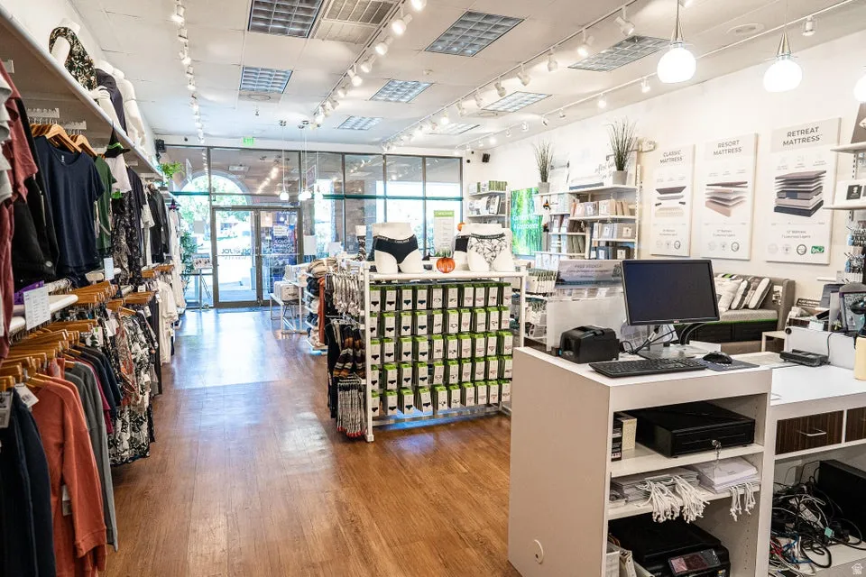 Office featuring rail lighting and floor to ceiling windows