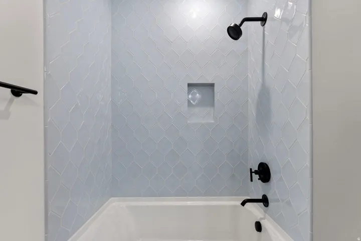 Bathroom with shower / tub combination