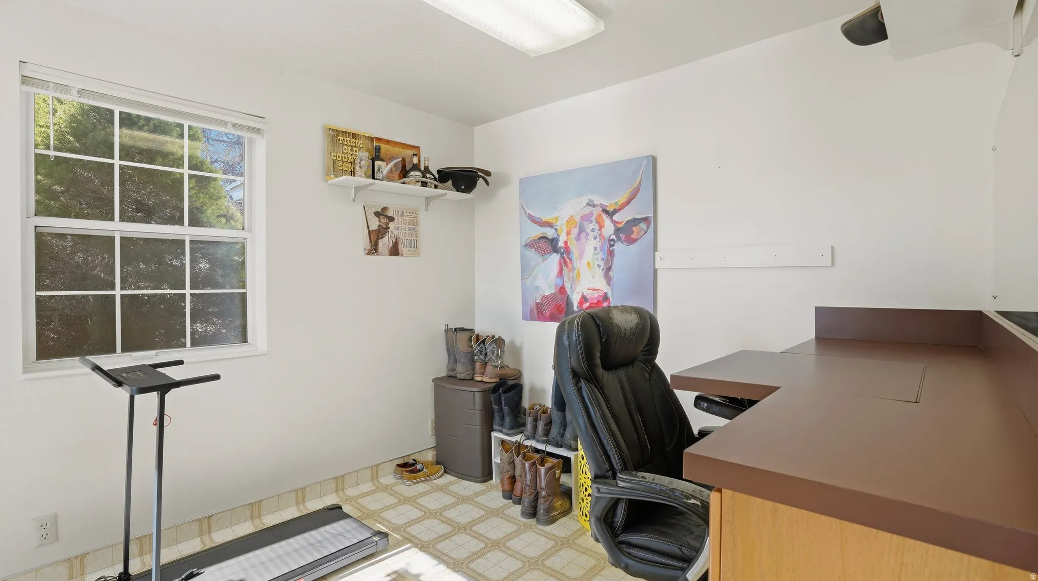 Office space featuring light flooring