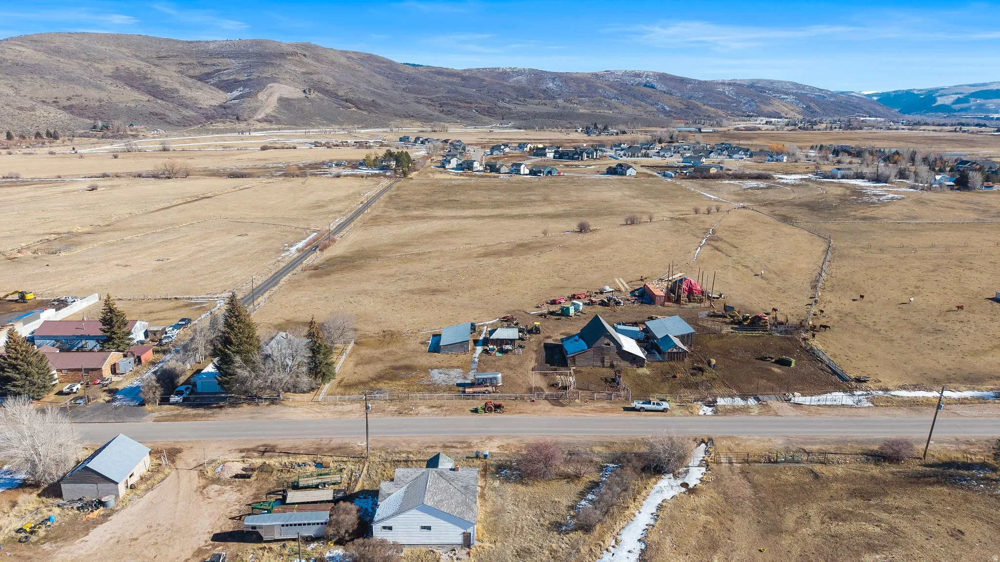 Overview of rural landscape featuring mountains
