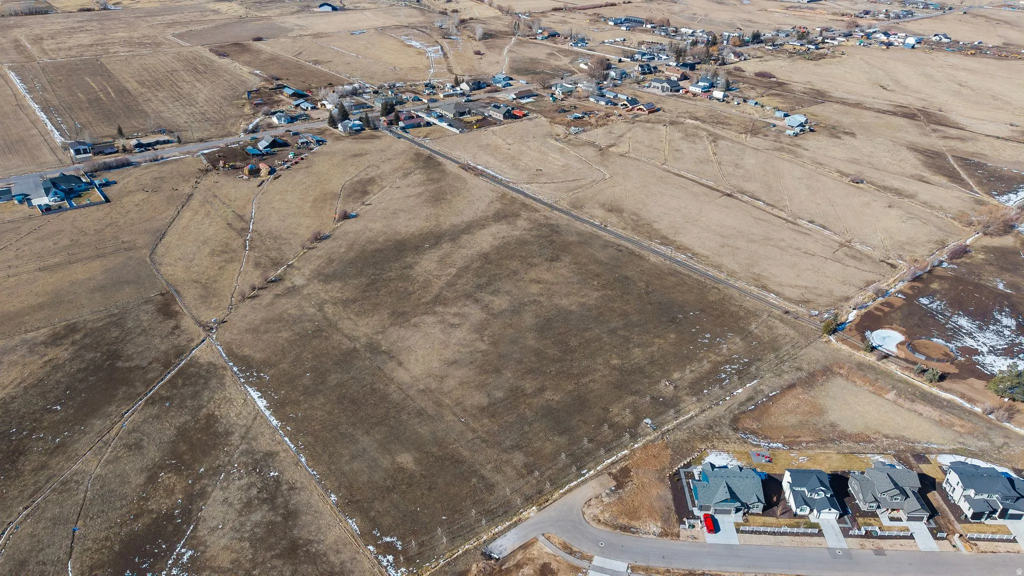 Overview of rural landscape with nearby suburban area