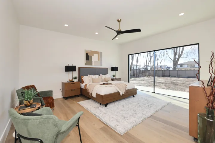 Bedroom featuring access to outside, light wood-style floors, ceiling fan, and recessed lighting
