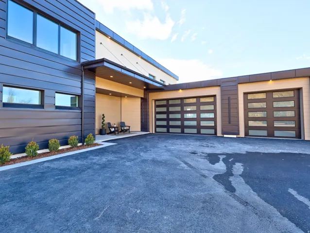 Garage featuring driveway
